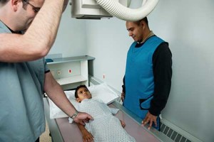 technologist-with-child-patient-xray